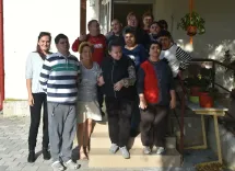 Residents of the House of Smiles with caregivers and Tünde.